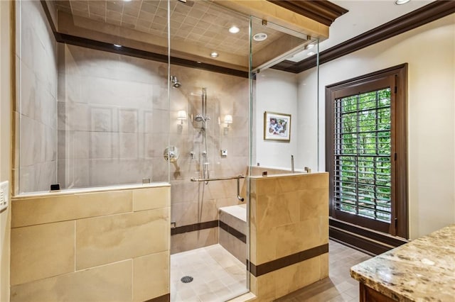 full bath with recessed lighting, a shower stall, vanity, and crown molding