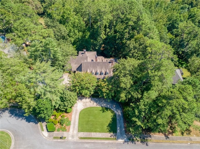 drone / aerial view with a view of trees