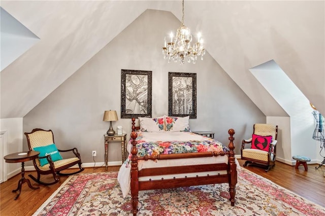 bedroom featuring a chandelier, baseboards, wood finished floors, and vaulted ceiling