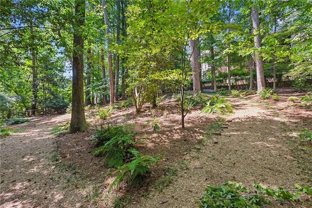 exterior space with a forest view