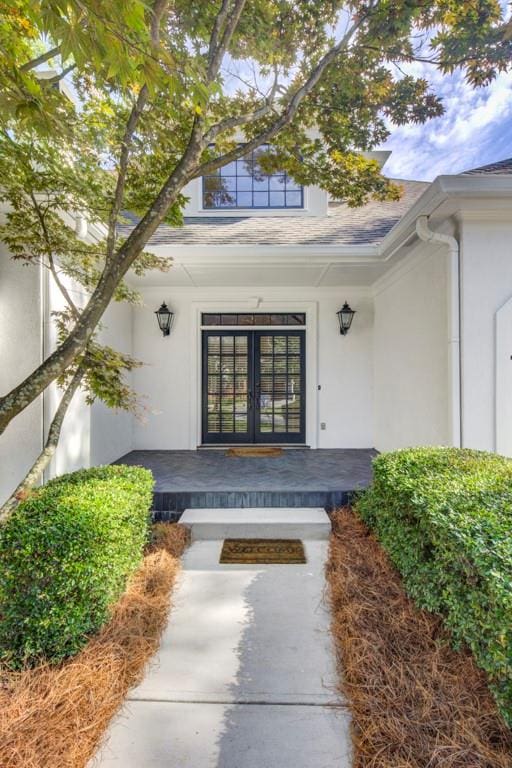 property entrance featuring french doors