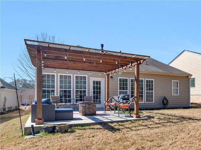 back of property featuring a patio area, a lawn, and a pergola