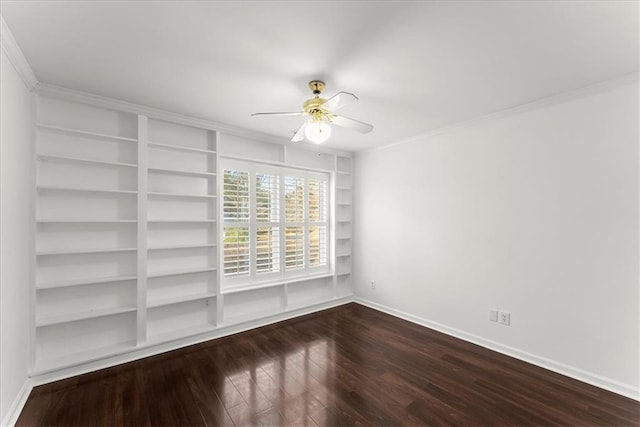 empty room with ceiling fan, ornamental molding, hardwood / wood-style floors, and built in features