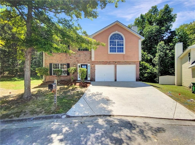 view of front of property with a garage