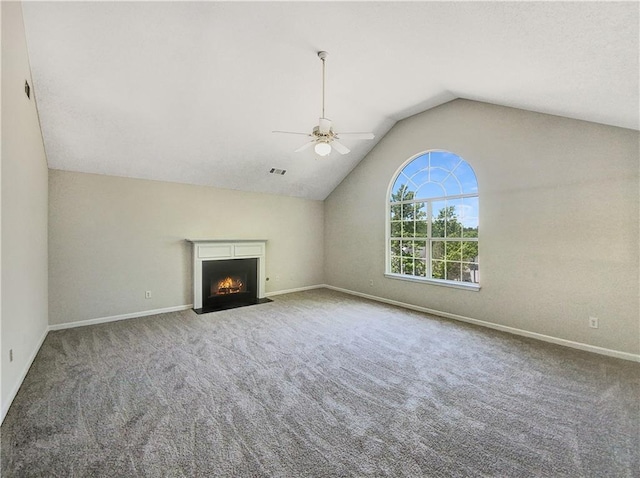 unfurnished living room with carpet flooring, ceiling fan, and lofted ceiling