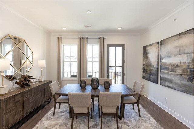 4923 Sudbrook Way Unit 233, Peachtree Corners, GA 30092 - dining room with light wood-style floors and ornamental molding