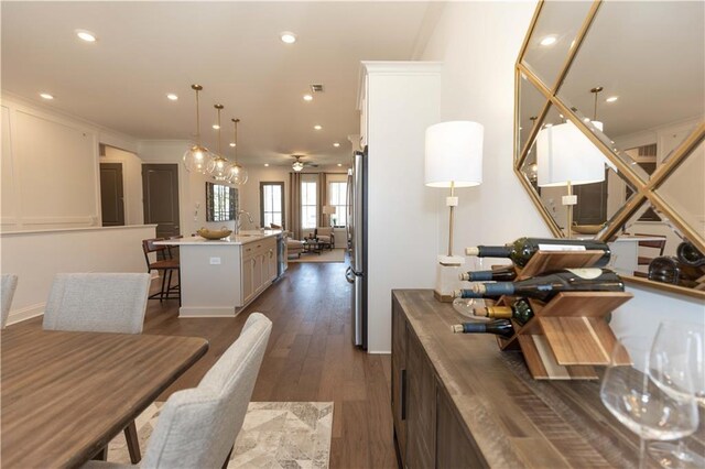 4923 Sudbrook Way Unit 233, Peachtree Corners, GA 30092 - dining room featuring recessed lighting, dark wood-style flooring, a ceiling fan, and ornamental molding