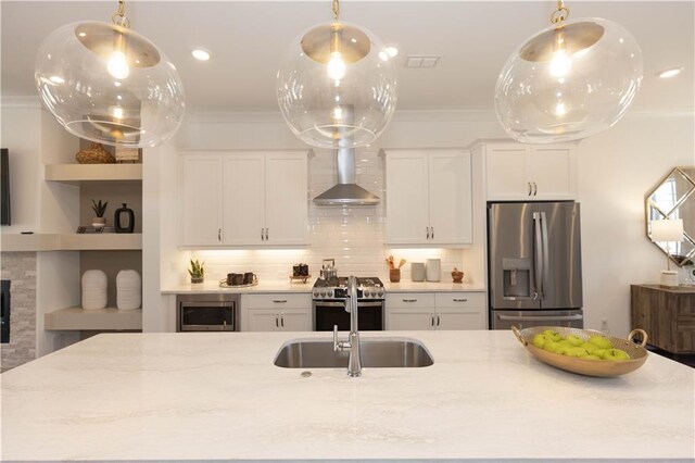 4923 Sudbrook Way Unit 233, Peachtree Corners, GA 30092 - kitchen with appliances with stainless steel finishes, wall chimney exhaust hood, ornamental molding, white cabinetry, and backsplash