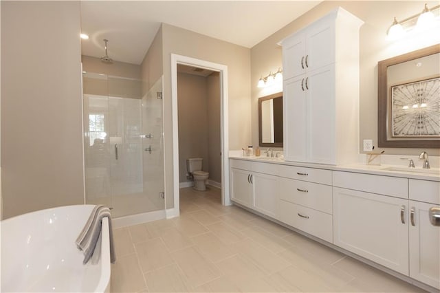 4923 Sudbrook Way Unit 233, Peachtree Corners, GA 30092 - bathroom featuring a stall shower, double vanity, and a freestanding tub