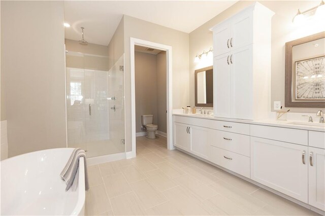 4923 Sudbrook Way Unit 233, Peachtree Corners, GA 30092 - full bathroom with a stall shower, double vanity, a soaking tub, and tile patterned floors