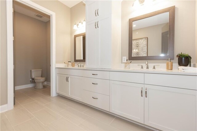 4923 Sudbrook Way Unit 233, Peachtree Corners, GA 30092 - bathroom with double vanity and tile patterned floors