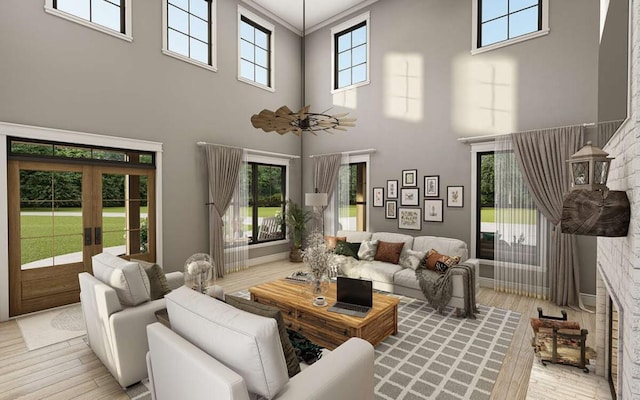 living room featuring a high ceiling, light wood-type flooring, and a fireplace