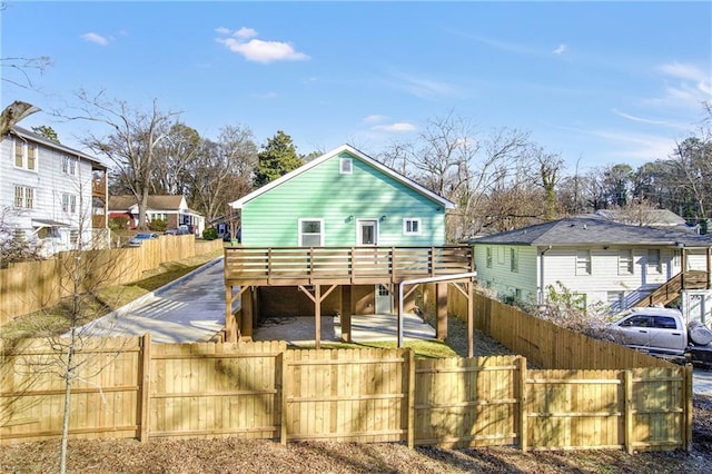 rear view of house with a deck