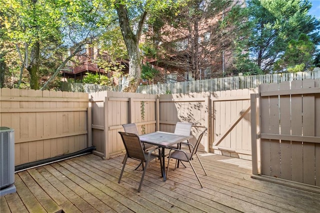 wooden deck with central air condition unit