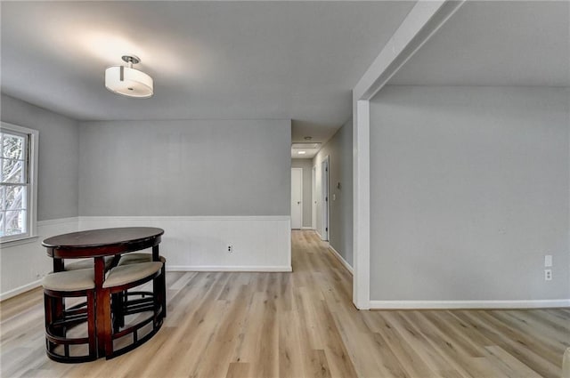 dining area with light hardwood / wood-style floors