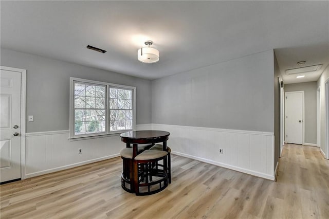 dining area featuring light wood-type flooring