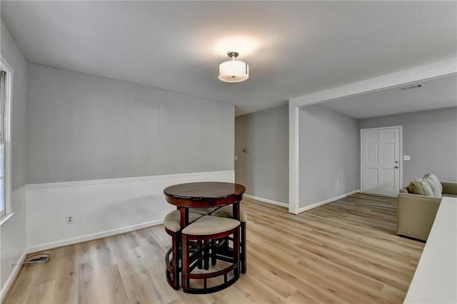 sitting room featuring light hardwood / wood-style flooring