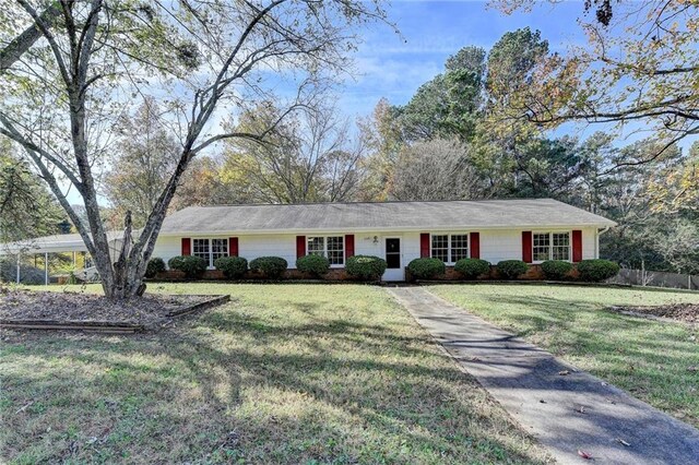 ranch-style house with a front yard