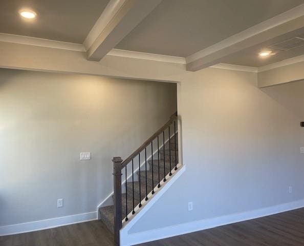 stairs featuring beam ceiling, crown molding, baseboards, and wood finished floors