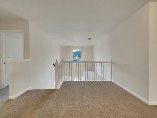 empty room featuring carpet