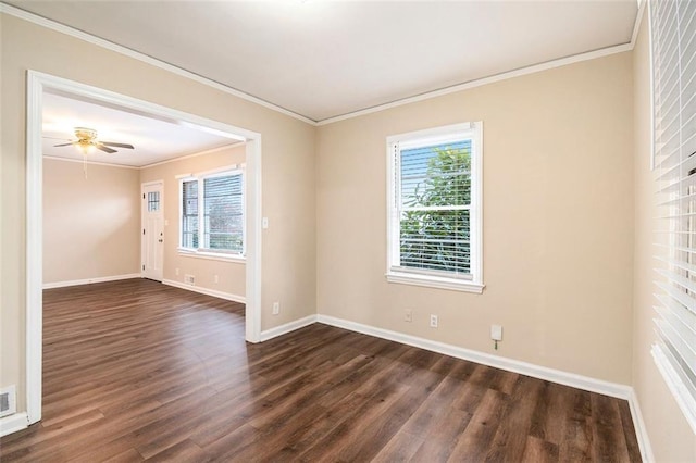 unfurnished room featuring dark hardwood / wood-style floors, ceiling fan, and ornamental molding