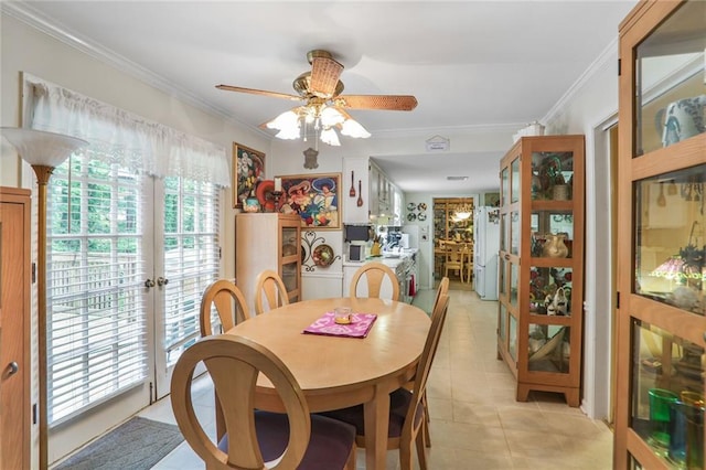 850 John Alden Rd, Stone Mountain, GA 30083 - dining space featuring french doors, light tile patterned flooring, ornamental molding, and a ceiling fan