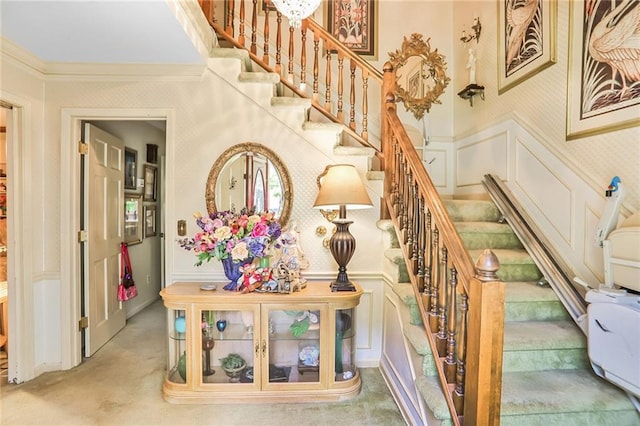 850 John Alden Rd, Stone Mountain, GA 30083 - stairway with wallpapered walls, a decorative wall, ornamental molding, carpet floors, and a wainscoted wall