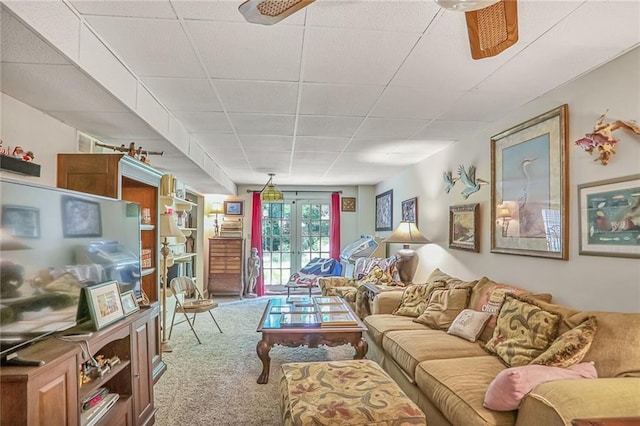 850 John Alden Rd, Stone Mountain, GA 30083 - carpeted living area with french doors and a paneled ceiling