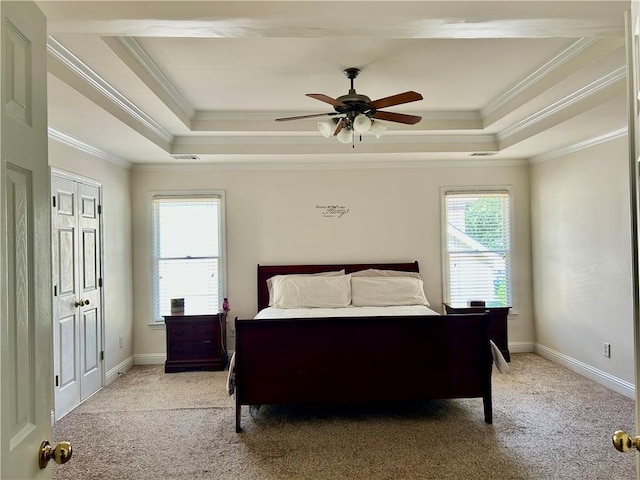 1055 Havenstone Walk, Lawrenceville, GA 30045 - bedroom with a tray ceiling, ornamental molding, light carpet, and a ceiling fan