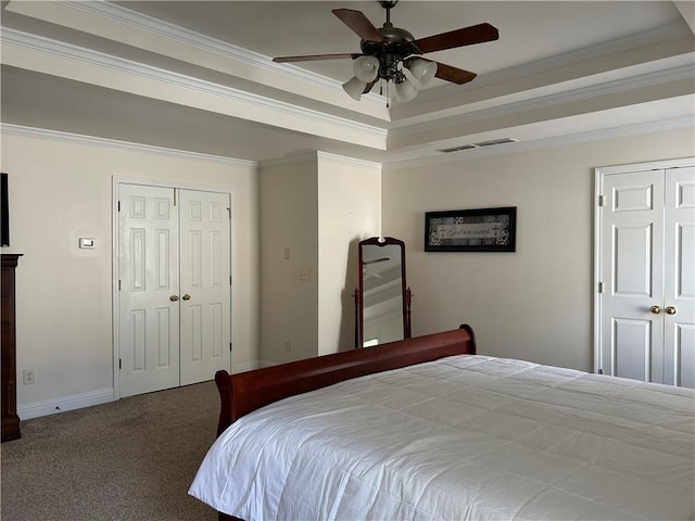 1055 Havenstone Walk, Lawrenceville, GA 30045 - carpeted bedroom featuring crown molding, a raised ceiling, ceiling fan, and a closet