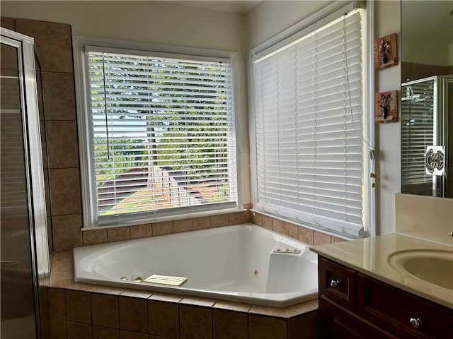 1055 Havenstone Walk, Lawrenceville, GA 30045 - full bathroom with vanity, a stall shower, and a tub with jets