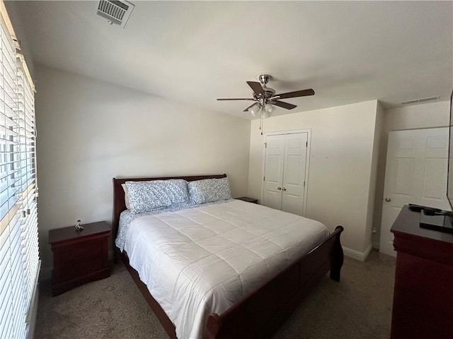 1055 Havenstone Walk, Lawrenceville, GA 30045 - bedroom with carpet flooring, a ceiling fan, and a closet