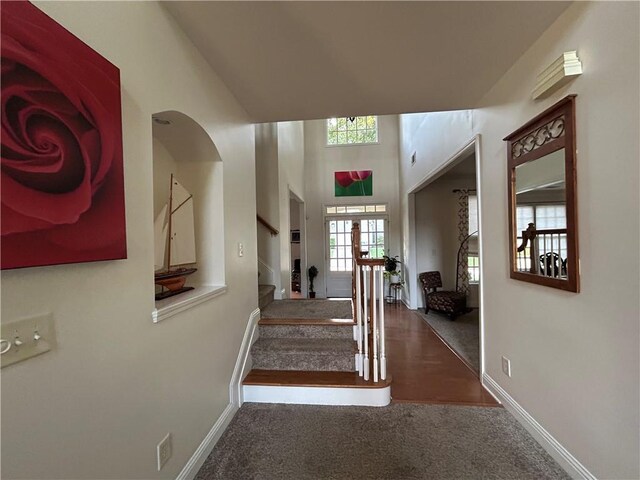 1055 Havenstone Walk, Lawrenceville, GA 30045 - foyer featuring stairs and carpet flooring