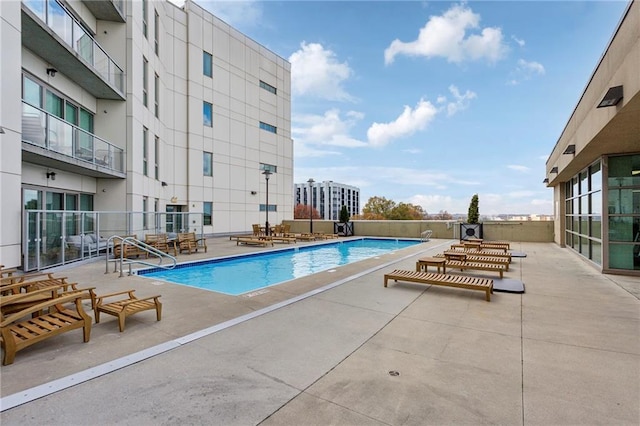 view of pool featuring a patio area