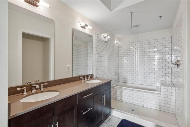 bathroom featuring vanity and a tile shower