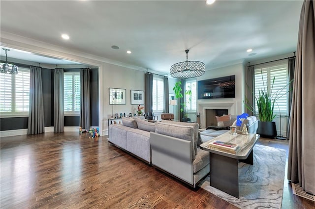 201 Dovecrest Dr, Atlanta, GA 30305 - living area with crown molding, plenty of natural light, baseboards, dark wood finished floors, and recessed lighting