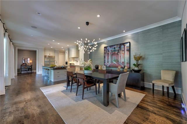 201 Dovecrest Dr, Atlanta, GA 30305 - dining room featuring a chandelier, baseboards, recessed lighting, dark wood-style flooring, and crown molding