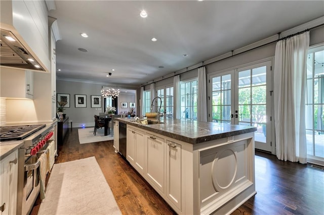 201 Dovecrest Dr, Atlanta, GA 30305 - kitchen featuring premium range hood, a sink, french doors, white cabinets, and dark wood-style floors