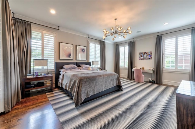 201 Dovecrest Dr, Atlanta, GA 30305 - bedroom with a chandelier, wood finished floors, crown molding, recessed lighting, and baseboards