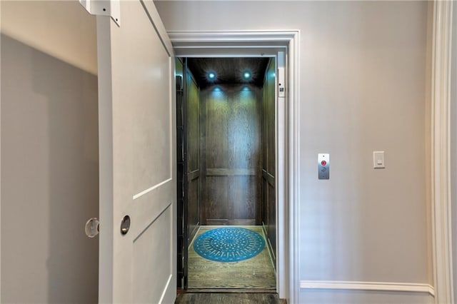 201 Dovecrest Dr, Atlanta, GA 30305 - elevator featuring wood finished floors