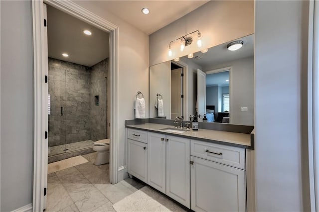 201 Dovecrest Dr, Atlanta, GA 30305 - bathroom with vanity, a stall shower, marble finish flooring, toilet, and recessed lighting