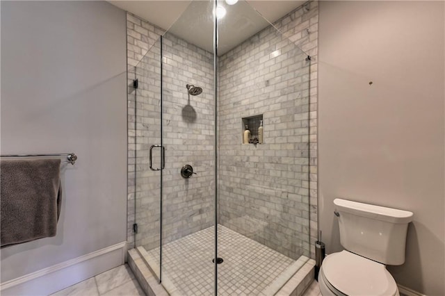201 Dovecrest Dr, Atlanta, GA 30305 - bathroom featuring toilet, a stall shower, baseboards, and tile patterned flooring