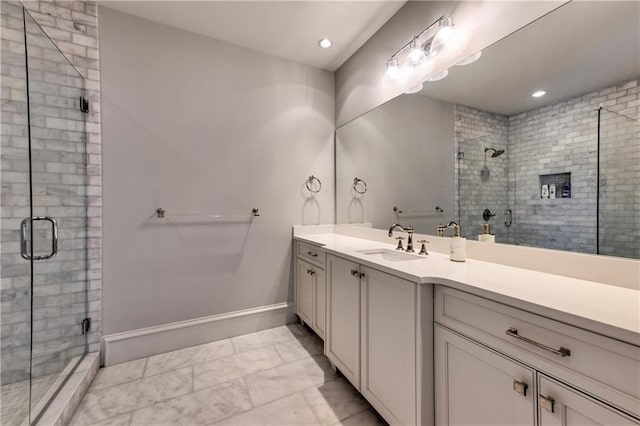201 Dovecrest Dr, Atlanta, GA 30305 - bathroom with marble finish floors, vanity, a stall shower, baseboards, and recessed lighting