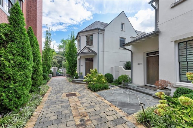 201 Dovecrest Dr, Atlanta, GA 30305 - view of front of property featuring stucco siding and a patio area