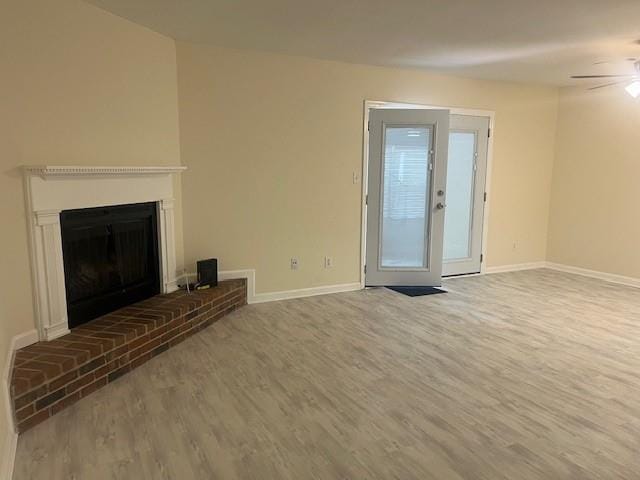 5950 Wintergreen Rd, Norcross, GA 30093 - unfurnished living room with wood finished floors and baseboards