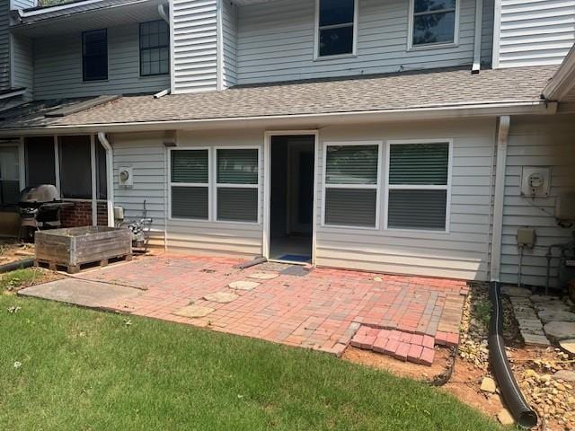 5950 Wintergreen Rd, Norcross, GA 30093 - rear view of house featuring a patio and a shingled roof