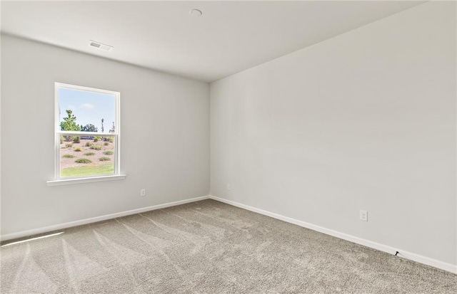 view of carpeted spare room