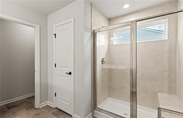 bathroom with an enclosed shower