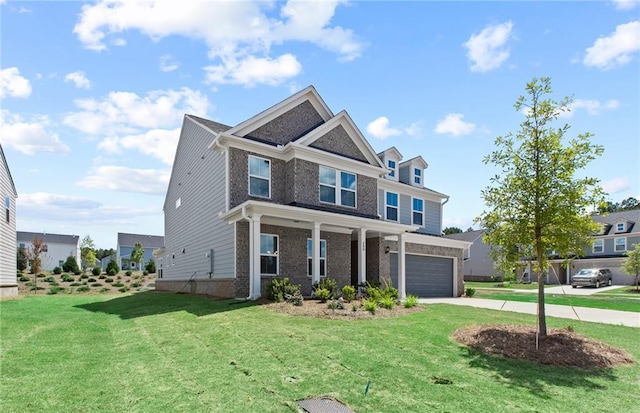 view of front of house featuring a front lawn and a garage