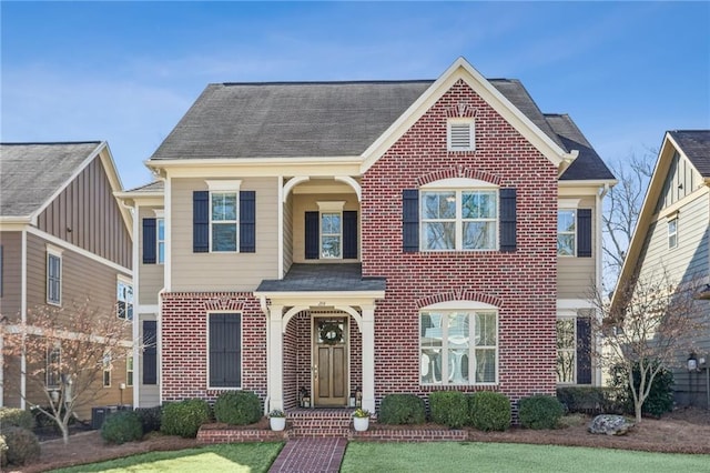 view of front of home with brick siding